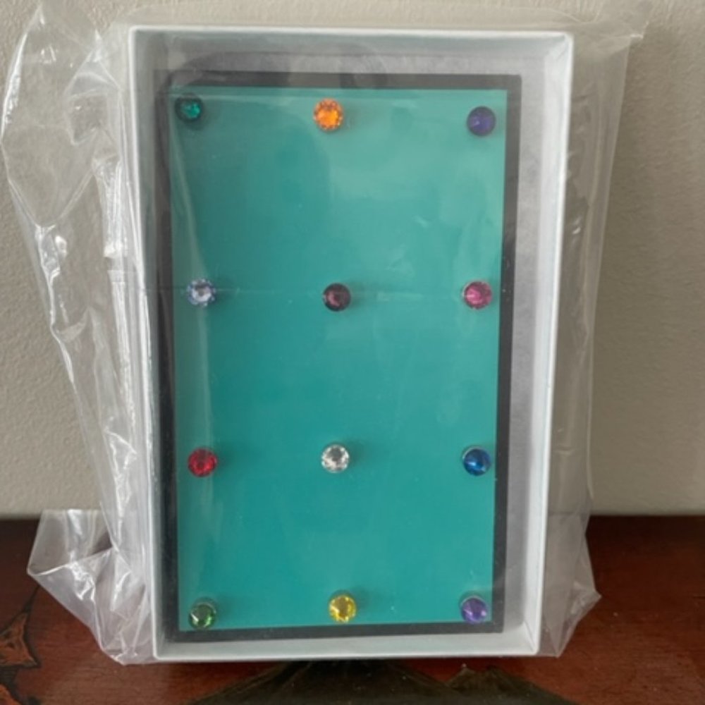 Simply Charmed brand magnetic Swarovski crystal wine charms.